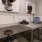 a mirror is above a table