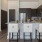 a kitchen with wooden cabinets