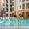 a swimming pool in front of a building