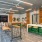 a kitchen with a bar and chairs
