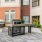 a brick patio with tables and chairs