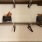 a shelf with purses and purses on it