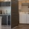 a kitchen with white appliances