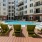 a pool with chairs around it